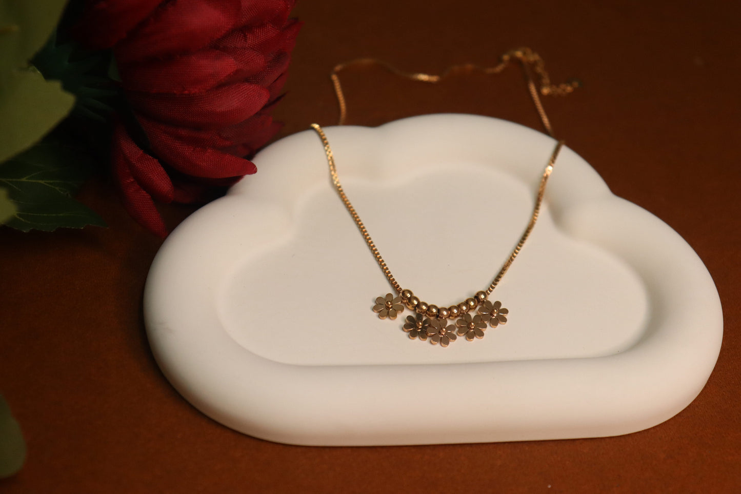 Golden Floral Necklace by JewelsMuse