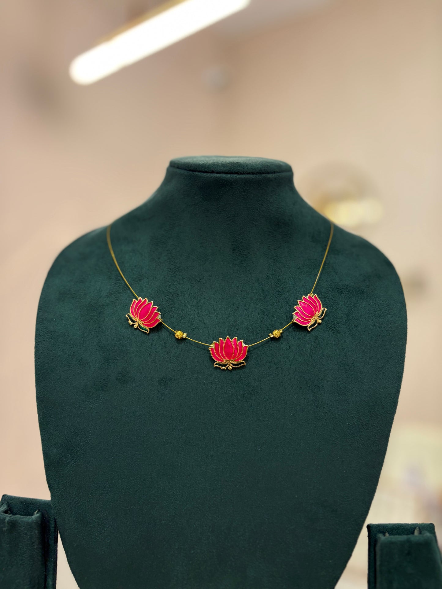 Invisible Ruby Lotus Necklace - JewelsMuse