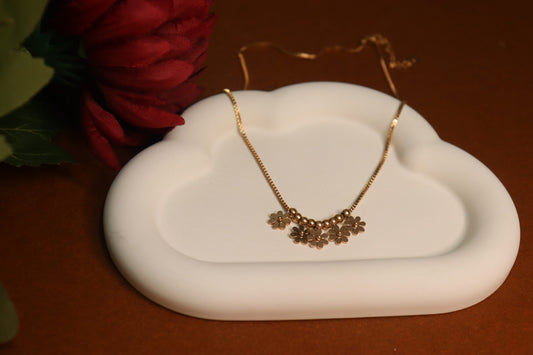 Golden Floral Necklace by JewelsMuse